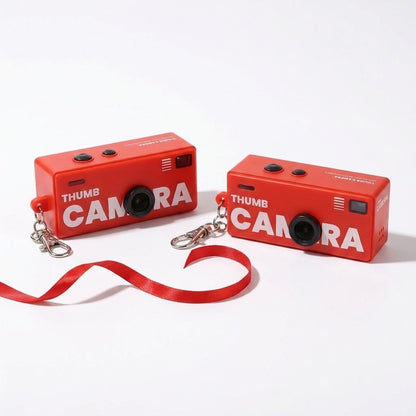 Pack de 2 minicámaras rojas con lazo, cada una con su microSD de 16 GB